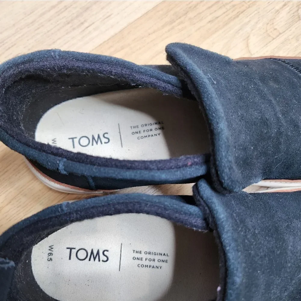 Tom's black Paxton platform slip on shoes